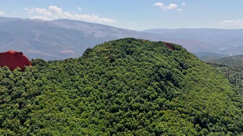 Approaching the mountain top covered with lush greenery. Amazing rocky landscape of Spain, Europe