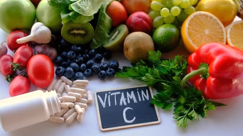 Colorful Fruits, Vegetables, and Vitamin C Supplements