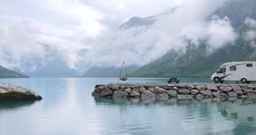 Family vacation travel RV, holiday trip in motorhome. Beautiful Nature Norway natural landscape.