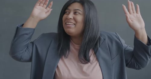 Enthusiastic Woman Dances with Joyful Energy