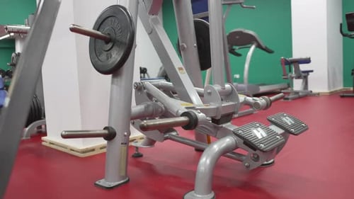 Compact Cozy Gym Features Sturdy Legpress Machine