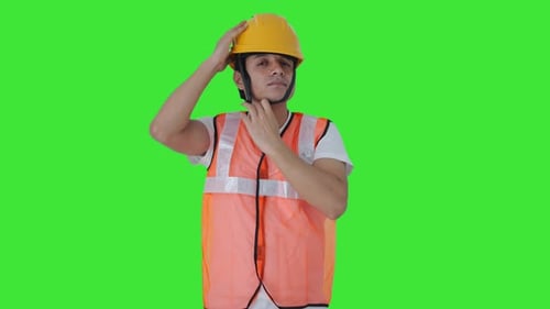 Indian construction worker wearing the helmet Green screen