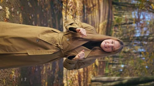 Elegant Pretty Female Walking Standing in Park in Autumn