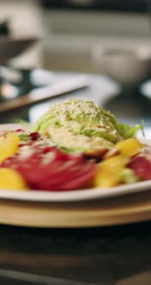 Cooking, salad and chef with plate of food for culinary, meal prep and dinner in restaurant