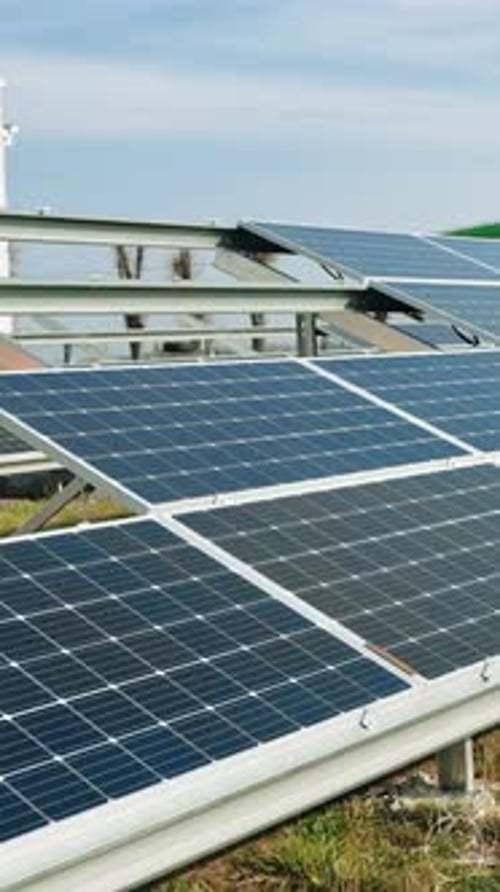 Installing Of Solar Cell. Male technician installing photovoltaic solar modules