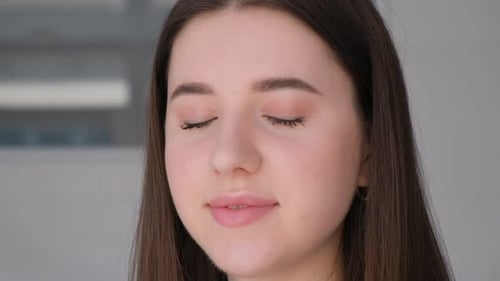 Young Woman Smiles Close Up Portrait
