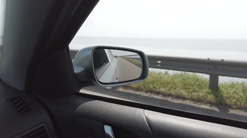 Crossing the river by the bridge inside car POV