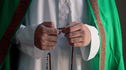 Man Hands Moving Prayer Beads Close Up