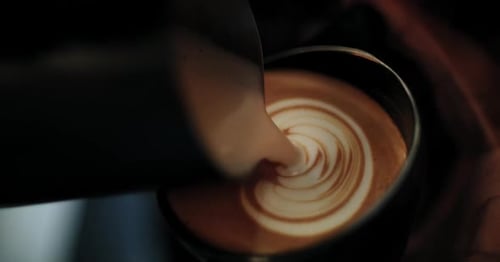 Barista Creates Elegant Latte Art Close Up