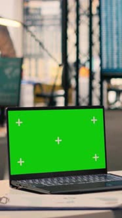 Vertical Video Isolated Chroma Key Laptop in a Multinational Company Office