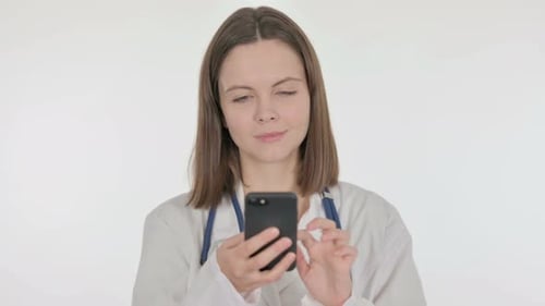 Young Adult Doctor Using a Smartphone in Hospital