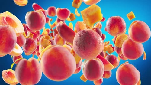 Falling Fresh Peaches and Peach Slices with Water Droplets