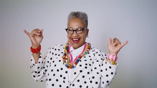 Funny senior woman wearing fashionable clothes