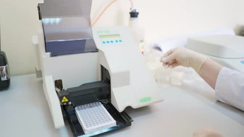 Medical device at work in lab. Automated machine for testing various samples in modern clinic.
