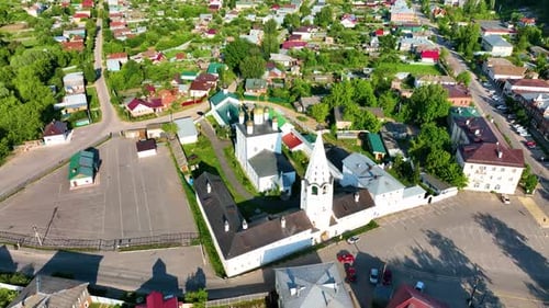 Aerial View of a Historic Monastery and Town