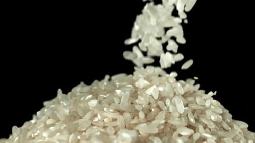 Rice Falling on a Black Background Filmed on a Highspeed Camera at 1000 Fps