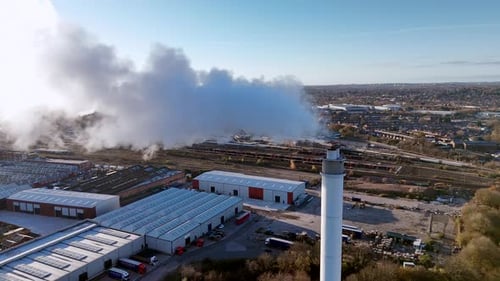 Industrial Smokestack Emitting Plume of Smoke