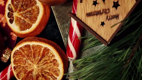 Festive Christmas Ornaments with Gift and Dried Oranges