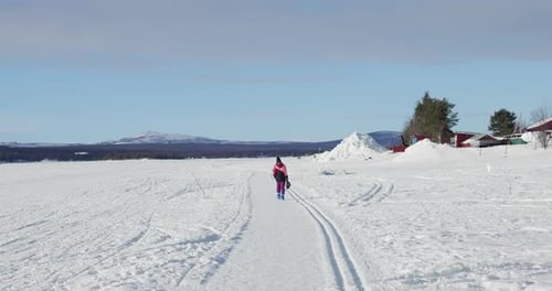 Walking on a frozen lake in the Swedish Lapland