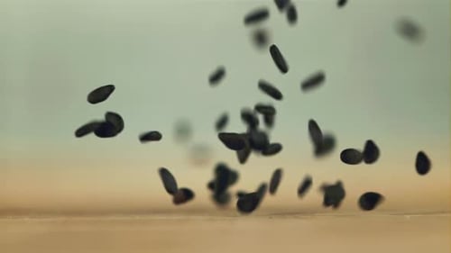 Falling Sesame Seeds on the Table