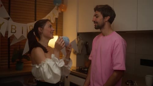 Couple Celebrating a Birthday at Home Together