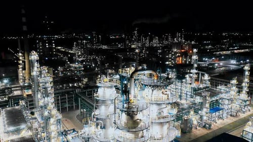Aerial view of chimneys of power plant, an industrial district. Modern large thermal power plant