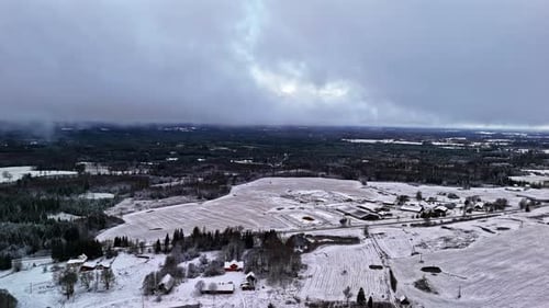 Snowy Fields and Forests Aerial View in Winter
