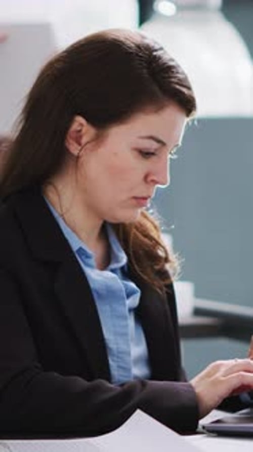 Vertical Video Portrait of Cad Engineer Planning Architectural Projects in Office