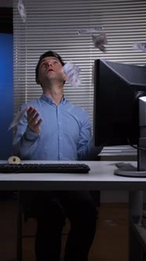Vertical Video Happy Man Sitting at His Desk with a Computer Monitor Giving a Thumbs Up Gesture and