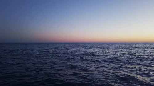 Ocean waves LOOP during sunset