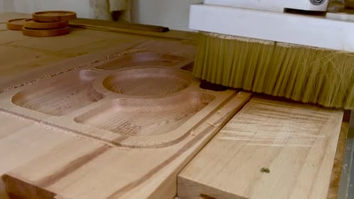 CNC router cutting on the wooden board. Cnc industry concept with cutting wood.