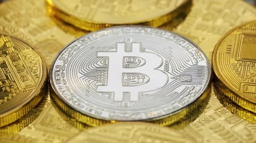 Close Up of Silver and Gold Bitcoin Coins