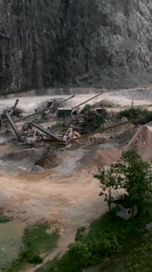 Aerial View of Quarry and Factory with Machines Micronizing Minerals to Make Cement in Hanoi Vietnam