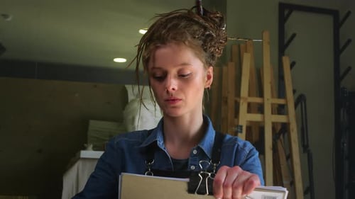 Young Artist Smiling in Art Studio