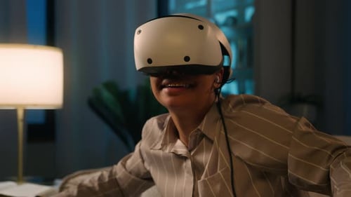 Woman Enjoying Virtual Reality Gaming at Night
