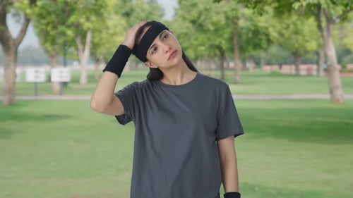 Indian woman doing neck exercise