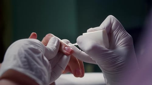 Applying Clear Nail Polish Manicure Treatment