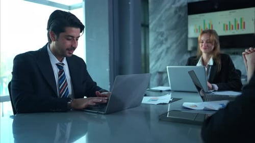 Modern Office Meeting With Laptops And Positive Vibe