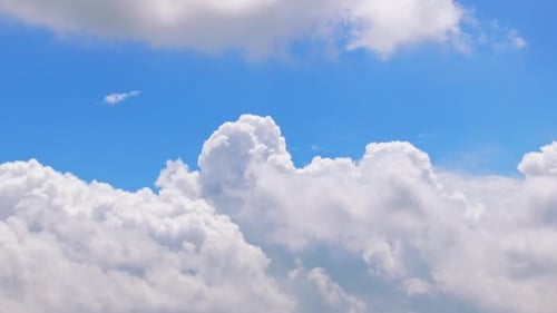 Clouds Drifting Across a Blue Sky Time-Lapse