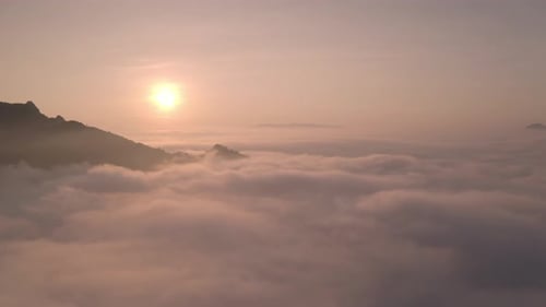 Video from a drone flying through fog and cloud layers.
