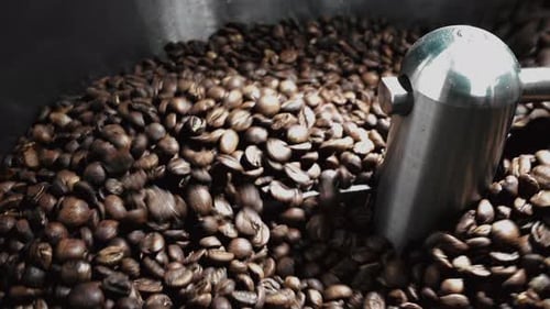 Roasting Coffee Beans Being Stirred