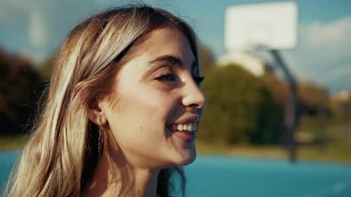 Smiling Woman in Urban Setting