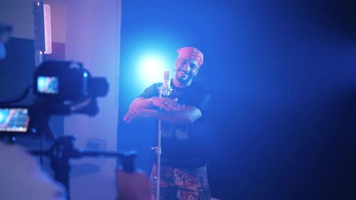 Reggaeton Singer Performing Music Video in Studio