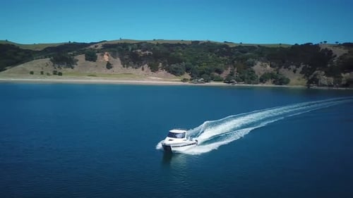 Motorboat Sails on the Water on a Sunny Day