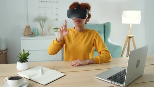 Woman Using VR Headset in Modern Office