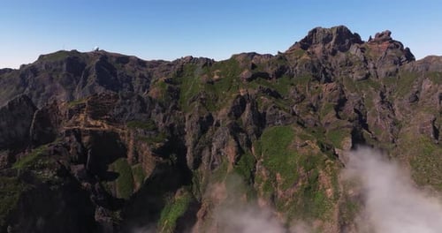 Aerial Crane Shot Above Pico do Arieiro Mountain Peak in Madeira, Portugal. Summer