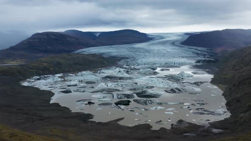 Aerial view of glacier and icebergs, Iceland.