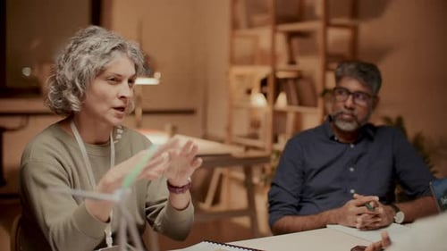 Team Discusses Green Energy Solutions at Office Meeting