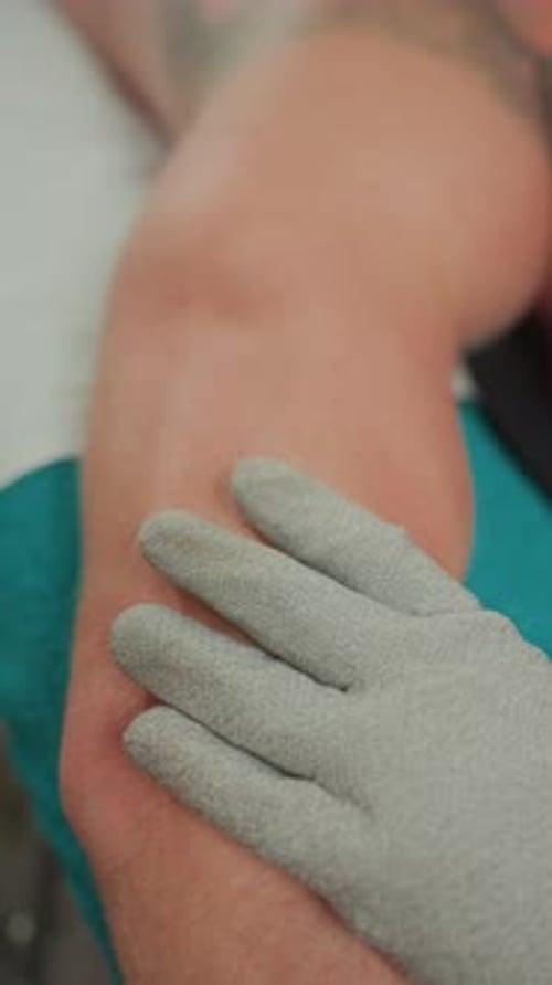 Gloved Hand Massaging Arm for Medical Treatment