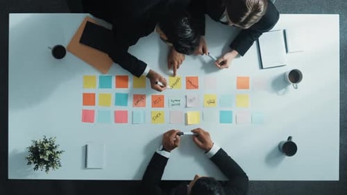 Top view of professional business team planning marketing strategy. Directorate.